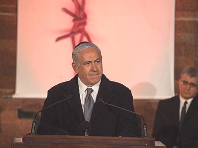 Israel's Prime Minister Benjamin Netanyahu speaks at a ceremony at the Yad Vashem Holocaust Memorial Museum in Jerusalem, as Israel marks the annual Holocaust Remembrance Day. Israel's Prime Minister Benjamin Netanyahu speaks at a ceremony at the Yad Vashem Holocaust Memorial Museum in Jerusalem, as Israel marks the annual Holocaust Remembrance Day.