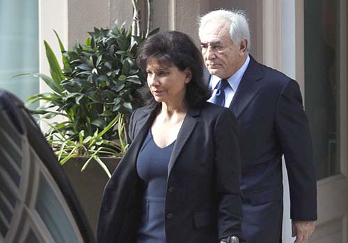 Dominique Strauss-Kahn and Wife Sue Mag for Saying They Separated Former IMF chief Dominique Strauss Kahn with his wife, Anne Sinclair.