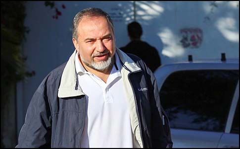 Ex Israel's Foreign Minister Avigdor Liberman leaves his house at the settlement of Nokdim at the moment after he resigned from his duty.