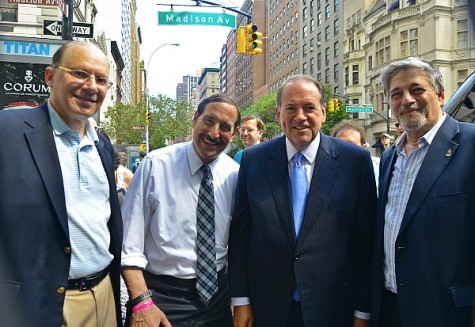 (L-R ) Ken Abramowitz, Chairman, American Friends of Likud; Dr. Joseph Frager, Concert Organizer;  and Dr. Paul Brody, Concert Chairperson, Huckabee (2nd from right), greet him upon arriving in NYC, to escort the Republican Presidential contender to the Israel Day Concert in Central Park, where he was the Keynote Speaker. 