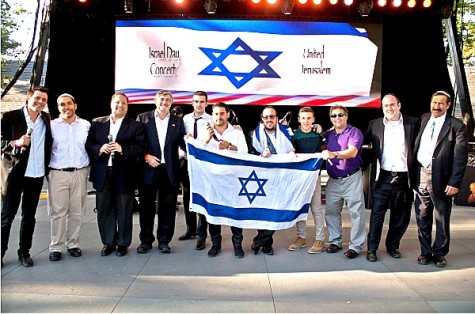 At 2014 concert: Zvika Bornstein (far left), musical director of the Concert, (L-R) Elron Zabatani, Shloime Dachs, who also conducted his orchestra; Concert Chairman, Dr. Paul Brody; Chazzan Yaakov Rosten; Gad Elbaz; LIPA; Edon; Chaim Kiss; Nachas; Concert Organizer, Dr. Joseph Frager.