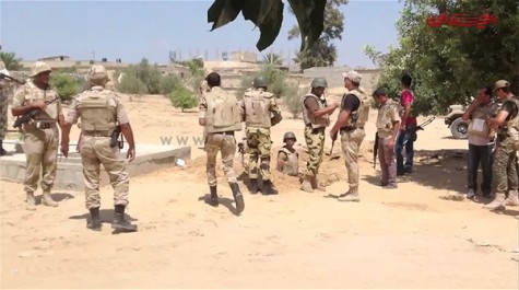 Egyptian soldiers prepare to blow up a large smuggling tunnel they discovered along Sinai's border with Gaza, September 2014. (Image source: Almyan video screenshot)