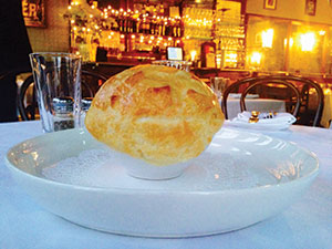 Onion soup "en croute" (caramelized onions in duck consommé topped with crispy pastry hat).