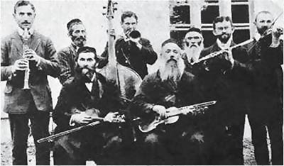 The Faust Family Band. Wolf Schwartz, also known as Wolf Zimbler, is seated on the right.