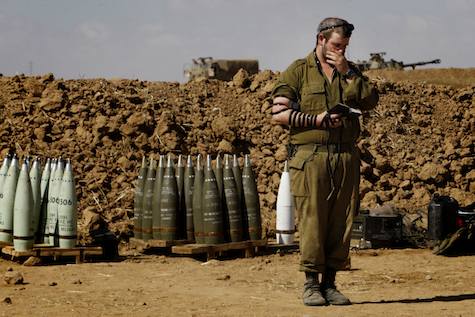 IDF soldier prays, waits for orders for a ground invasion of Gaza