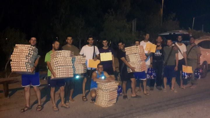 Happy soldiers with pizza