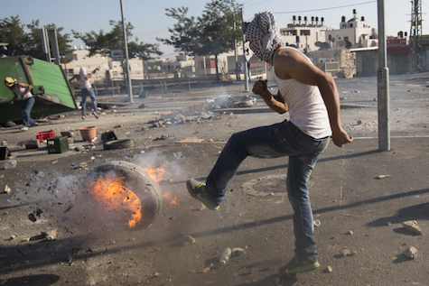 Palestinians clash with border police during funeral of Mohammed Abu Khdeir, July 4, 2014. 