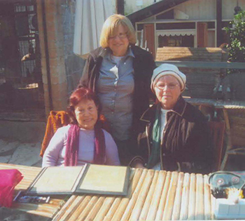 Seated left to right, Talia Hahn and LIbby Weinberger standing: Sanding Epstein