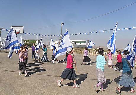 Migron children preparing for Israel's Independence Day. Photo: Anav Silverman, / Tazpit News Agency. Migron children preparing for Israel's Independence Day. Photo: Anav Silverman, / Tazpit News Agency.