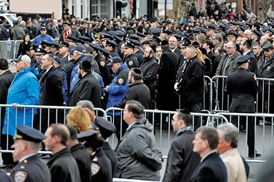 Orthodox Jews were highly visible Sunday at the Brooklyn funeral of slain New York City police officer Wenjian Liu. As one mourner put it, "The Jewish community needs to show support to the NYPD."