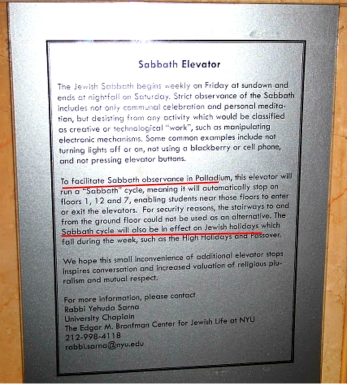 Plaque on the wall next to the Sabbath Elevator in Palladium Hall, an NYU dorm.