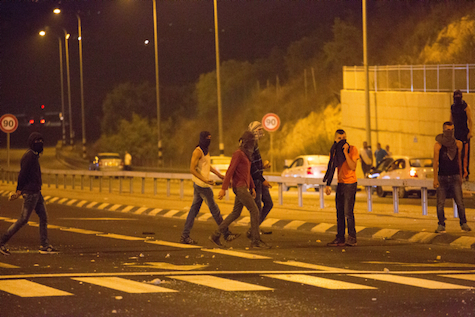 Palestinians throw stones at Israeli Police, July 5, 2014