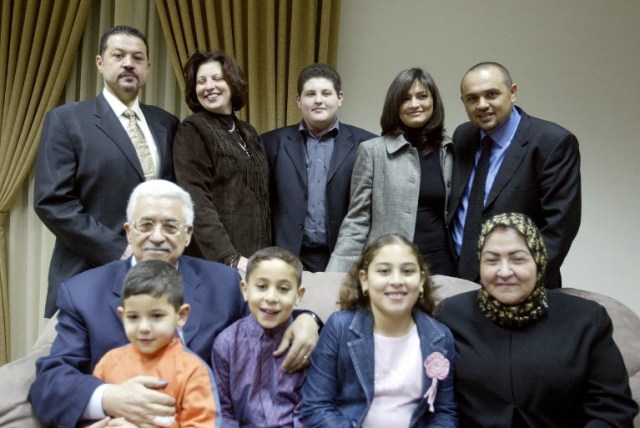 Mahmoud Abbas, his wife (front row, bottom right), son Yasser (top left), son Tareq (top right), and their families. Photo taken in 2005.