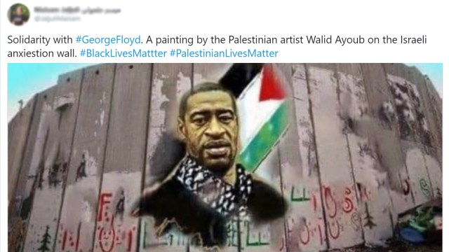 A tweet showing a mural of George Floyd wearing a keffiyeh