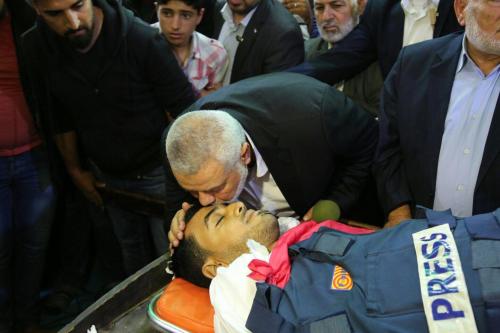 Hamas leader Ismail Haniyeh at the funeral of a Palestinian photographer killed in Gaza