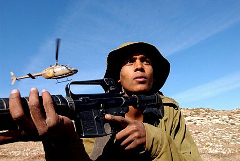 The soldiers practiced storming an area, and operating under bio-chemical attack and protecting a helicopter that was to land in an open field.