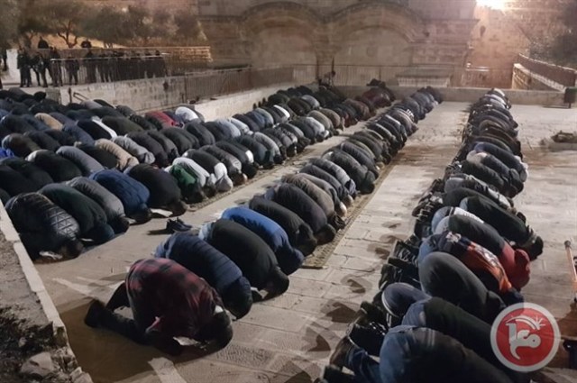 Muslims praying at the Golden Gate