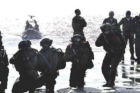 Soldiers of the IDF's elite naval commando unit 'Shayetet 13' are getting ready for a training exercise on a Sa'ar 5-class Corvette of the Israeli Navy. Photo by: IDF