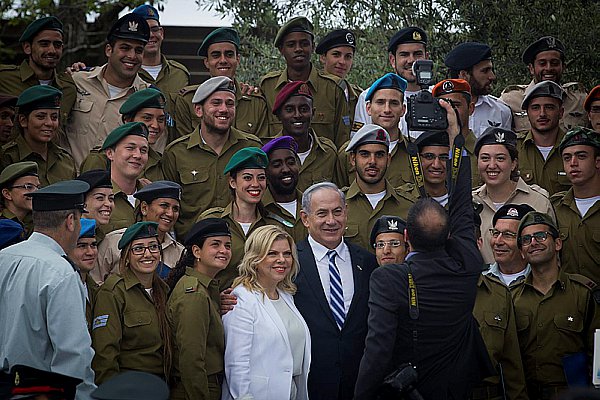 Prime Minister and Sara Netanyahu with soldiers awarded for distinguished service.